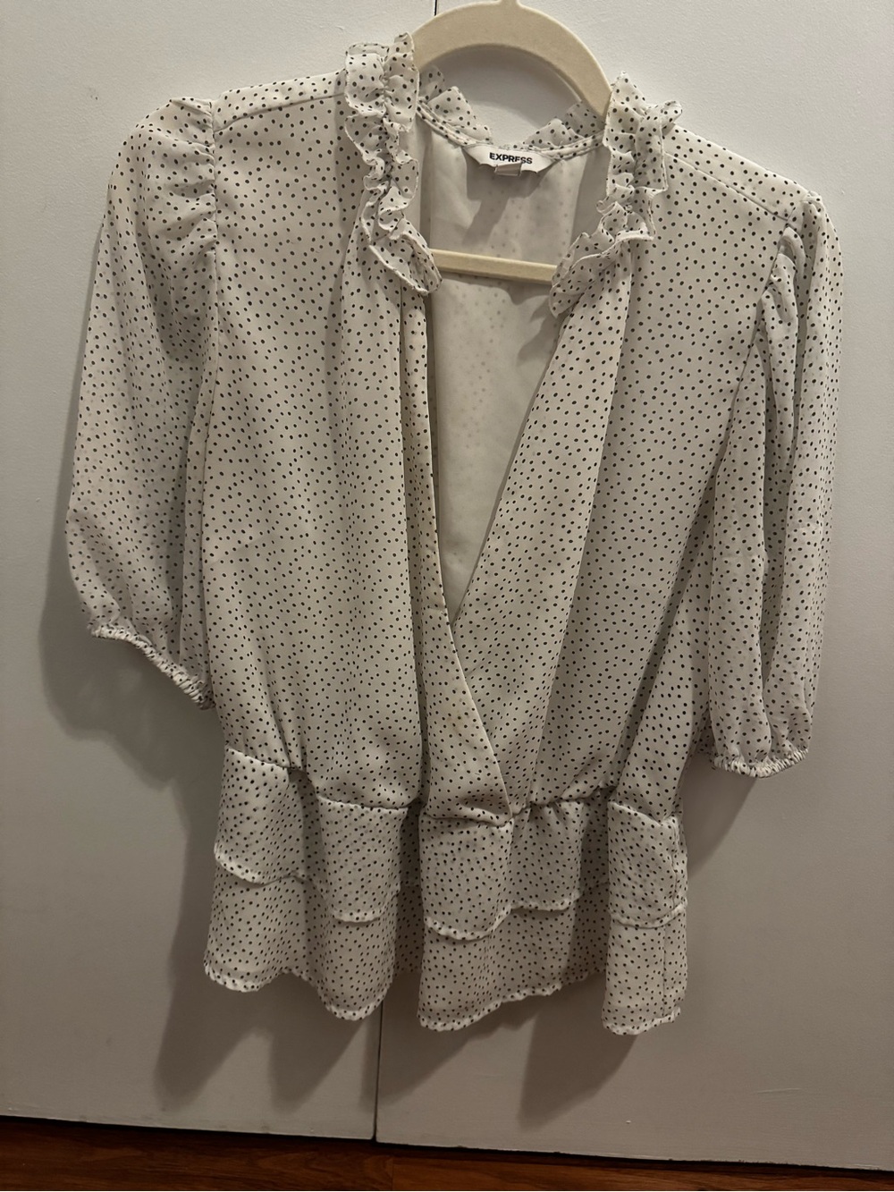 Express Cream Blouse with Black Polka Dots and Ruffle Neck